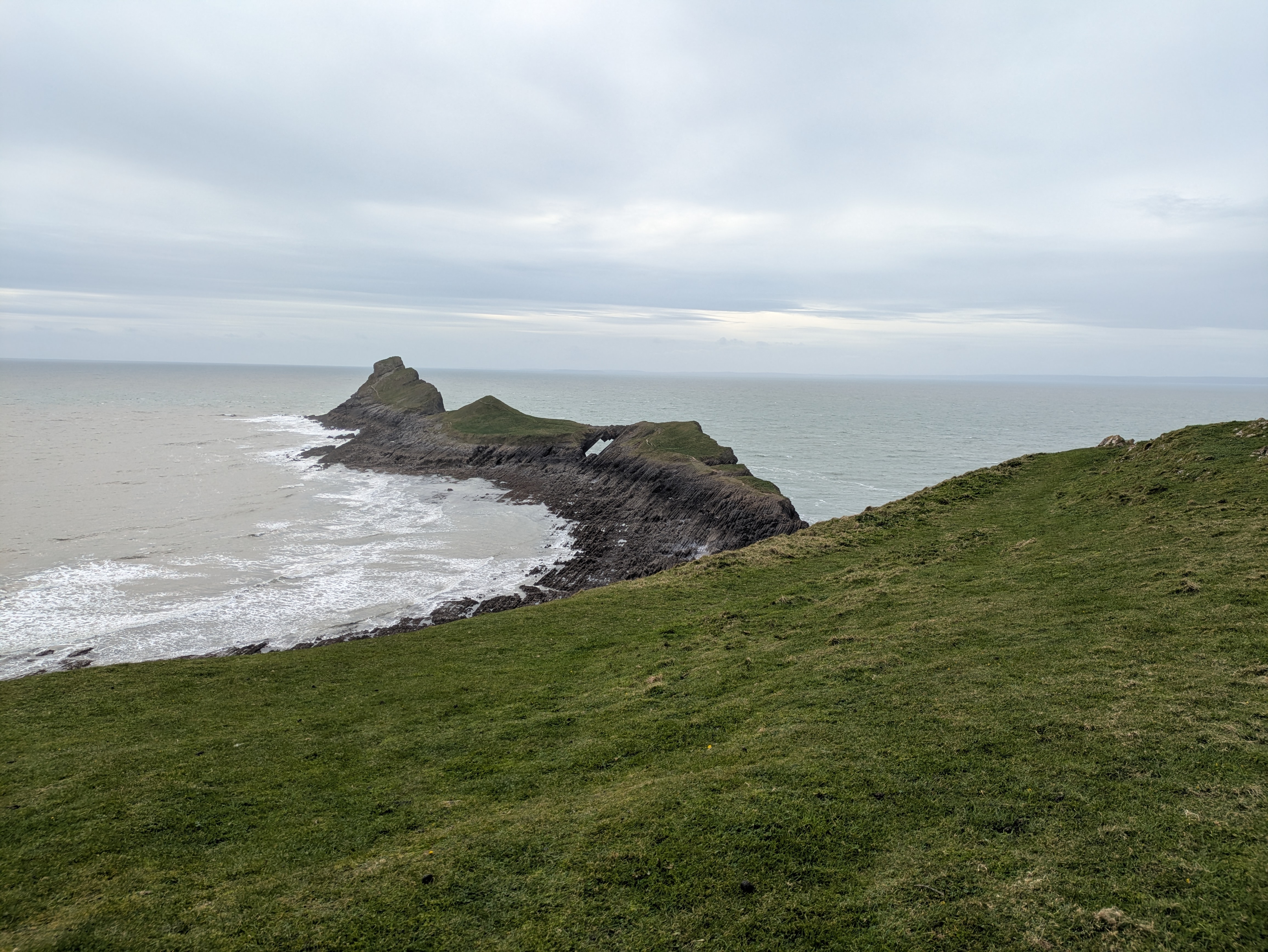 A photo of Worm's head, looking out to sea